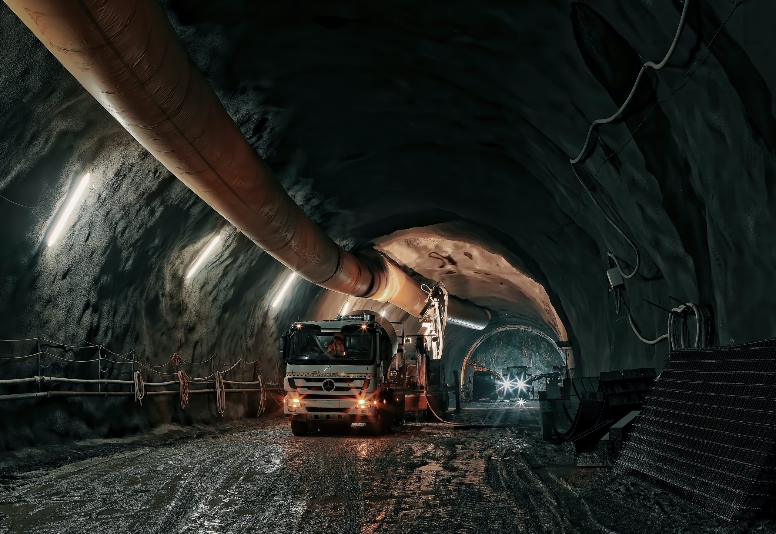 red and black truck in tunnel